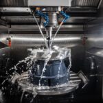 Metalworking CNC lathe milling machine. Cutting metal modern processing technology.